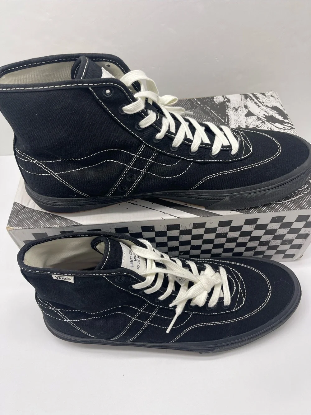 Vans Men’s High-Top Canvas Sneakers in Black and White